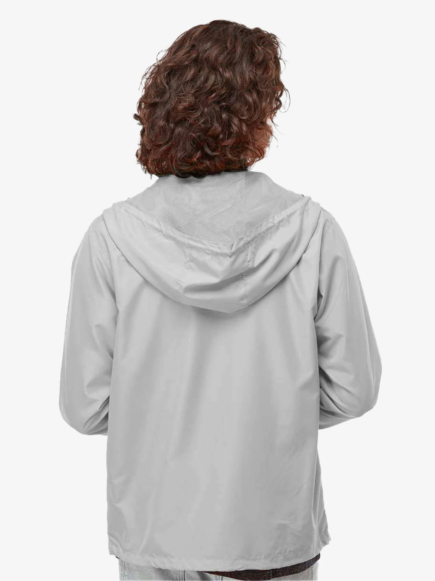 Coach wearing white Mountain View Rugby windbreaker on sideline